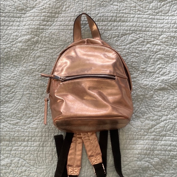 French Connection Jace Metallic Mini Backpack in Rose Gold - Picture 1 of 9